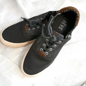 Crevo dark grey canvas sneakers with brown leather accents. Size 9